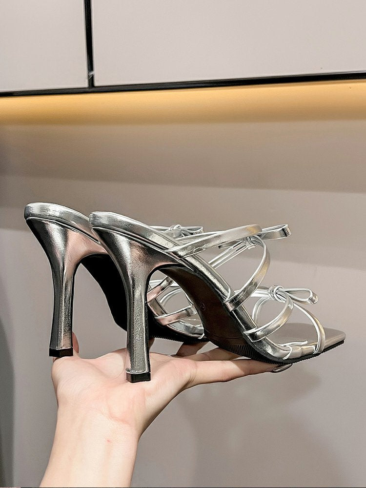Bow tie stiletto heel sandals