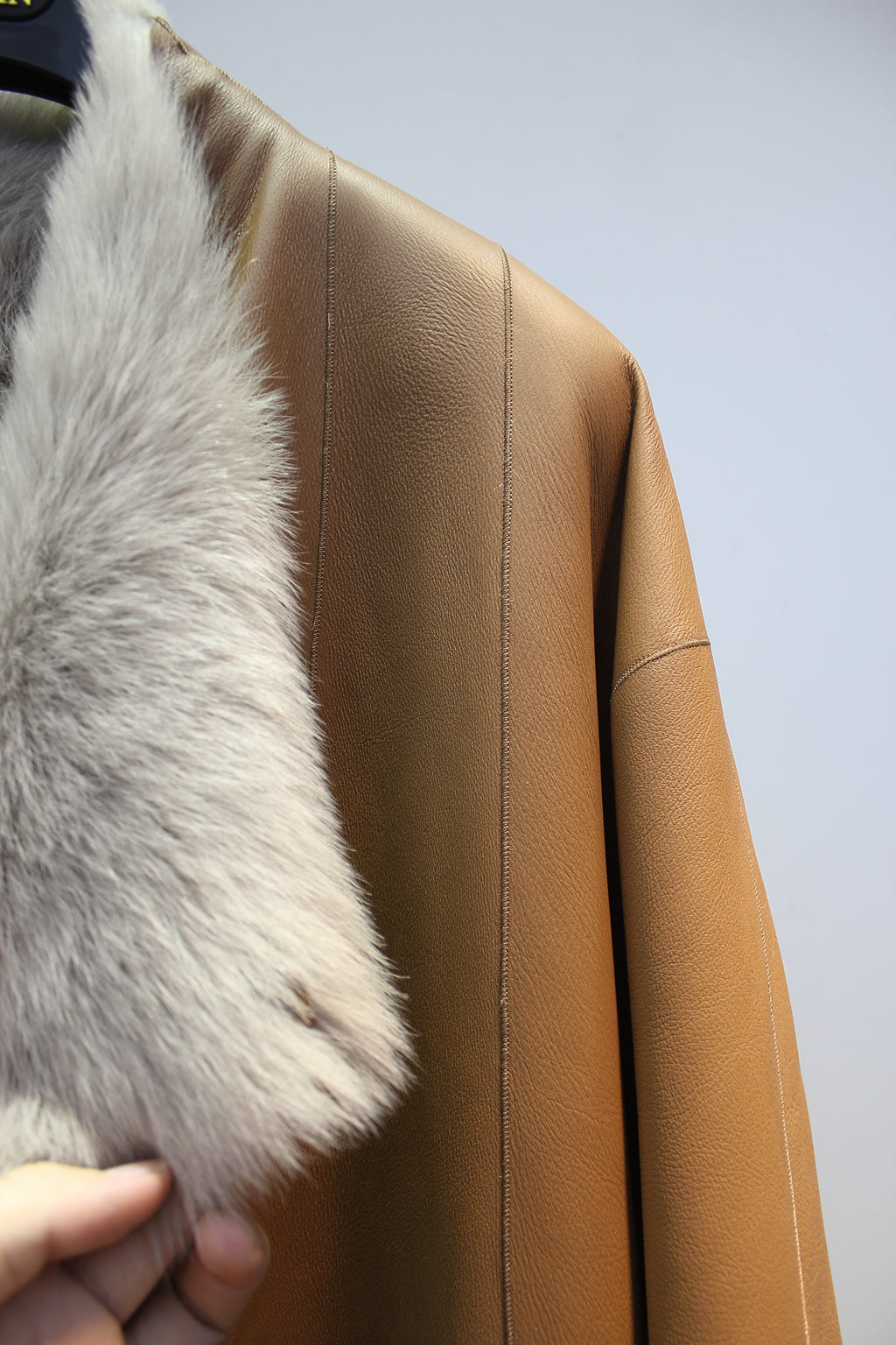 Palace-level Spanish Little Tuscan sheepskin all-in-one mid-length coat
