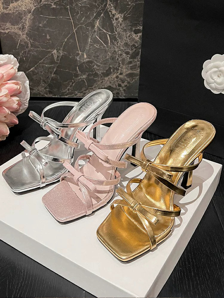Bow tie stiletto heel sandals