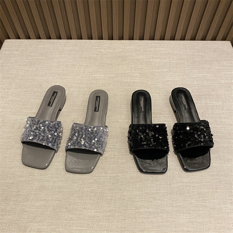 Wear elegant black rhinestone thick heel square toe sandals