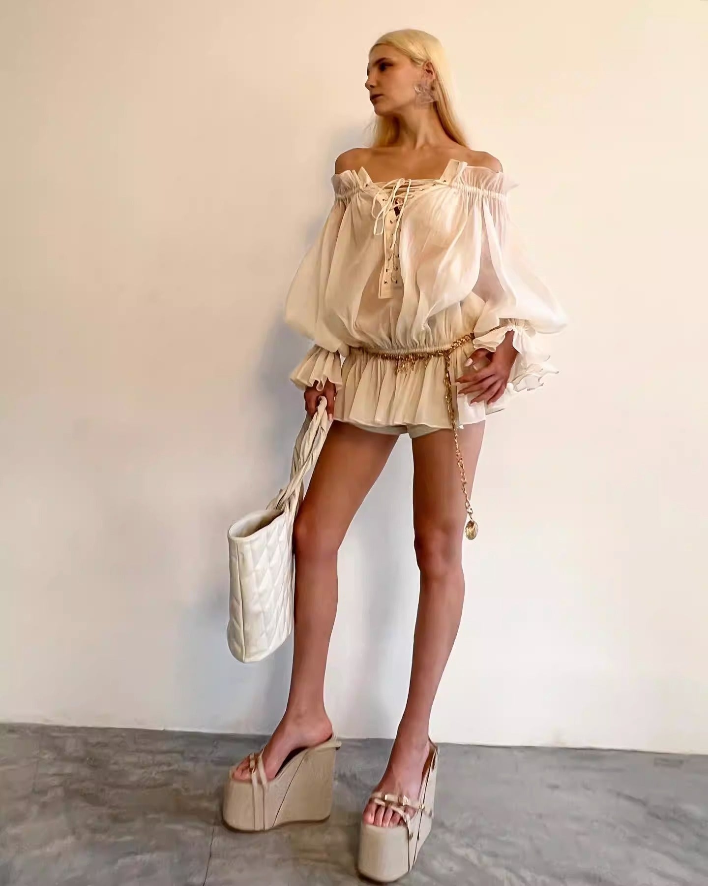 One-shoulder lantern sleeve lace-up top
