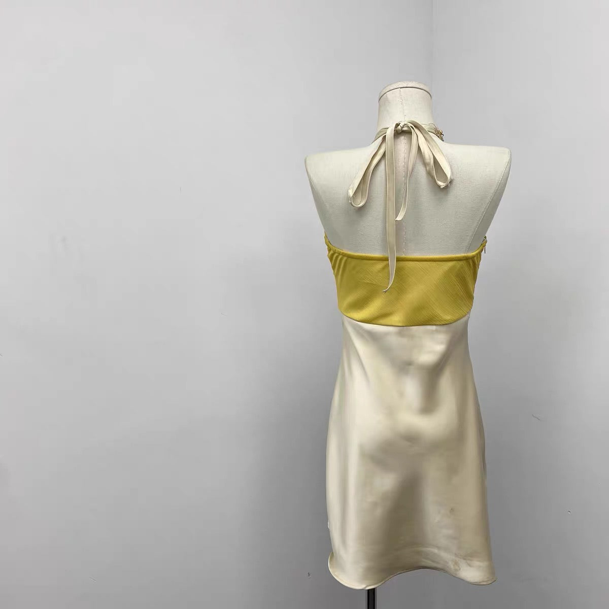 Hand-sewn heavy-duty diamond button halter dress