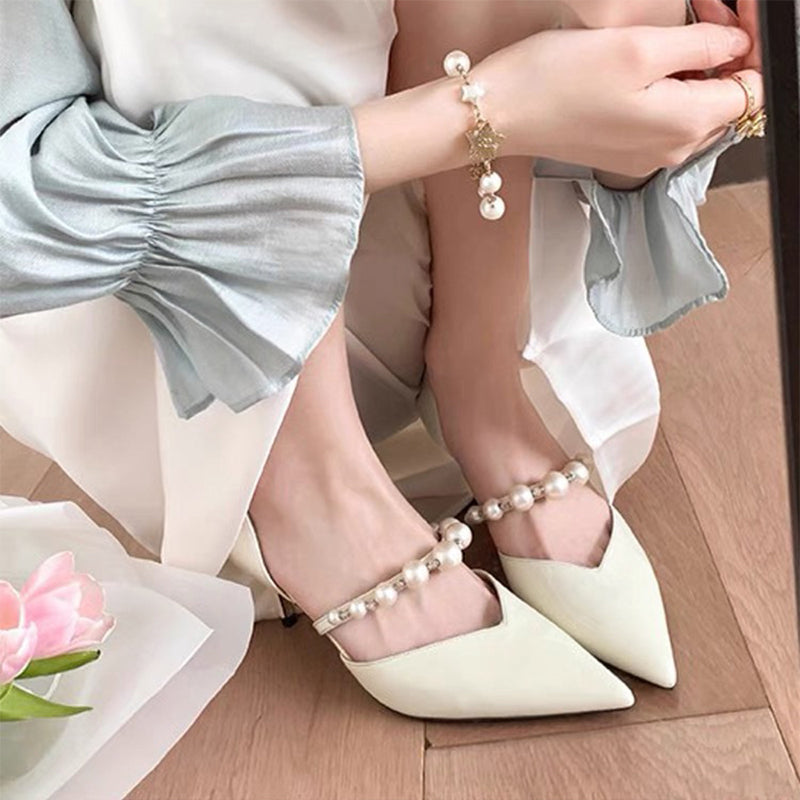 Pointed patent leather French stiletto pumps
