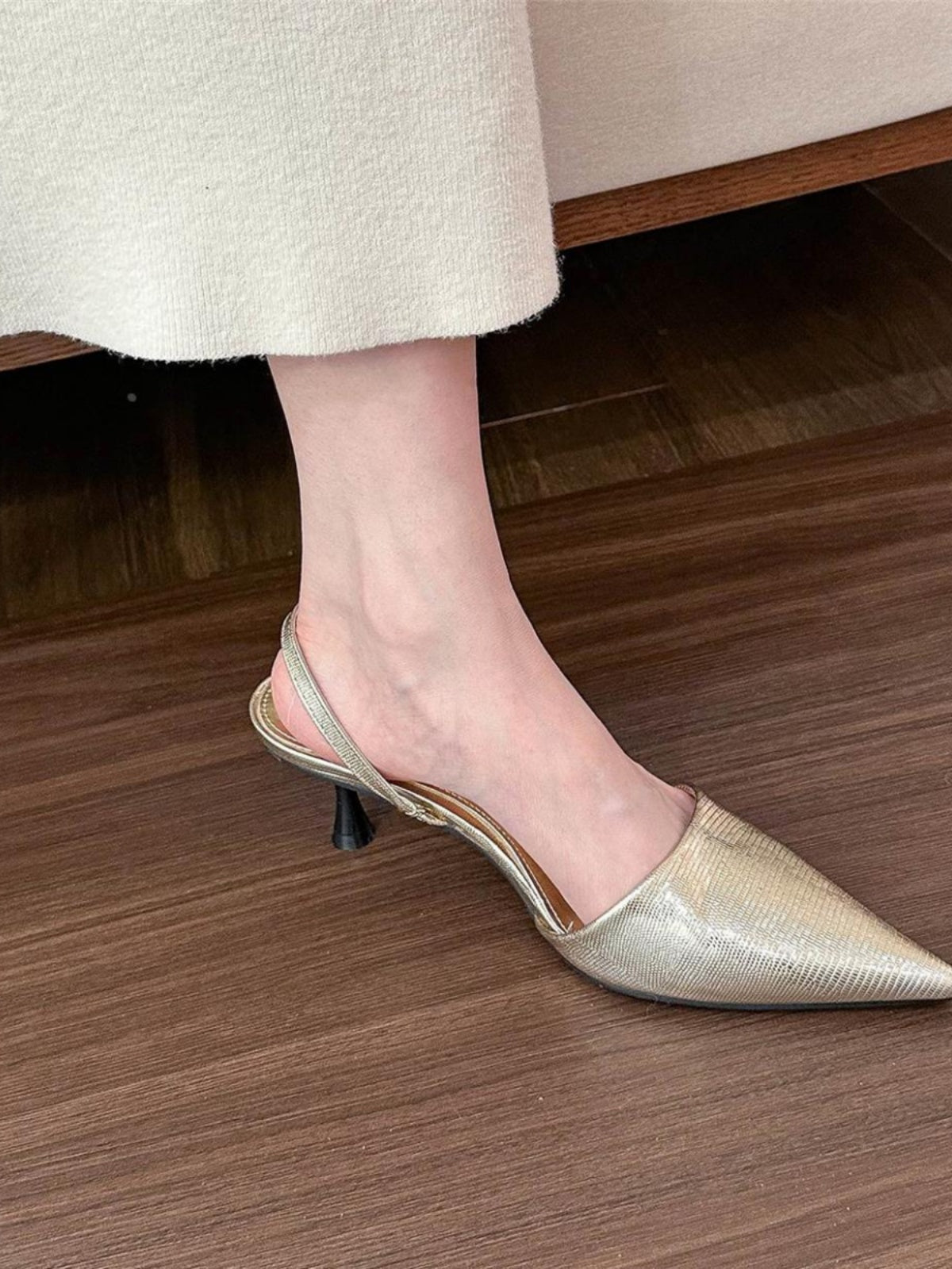 Golden pointed toe shallow back high heels