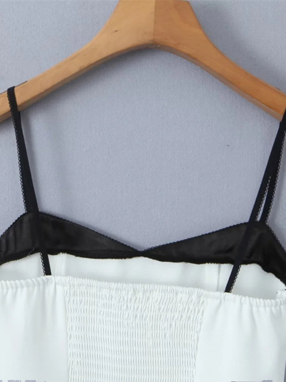 Two pieces of color matching small suspender clips