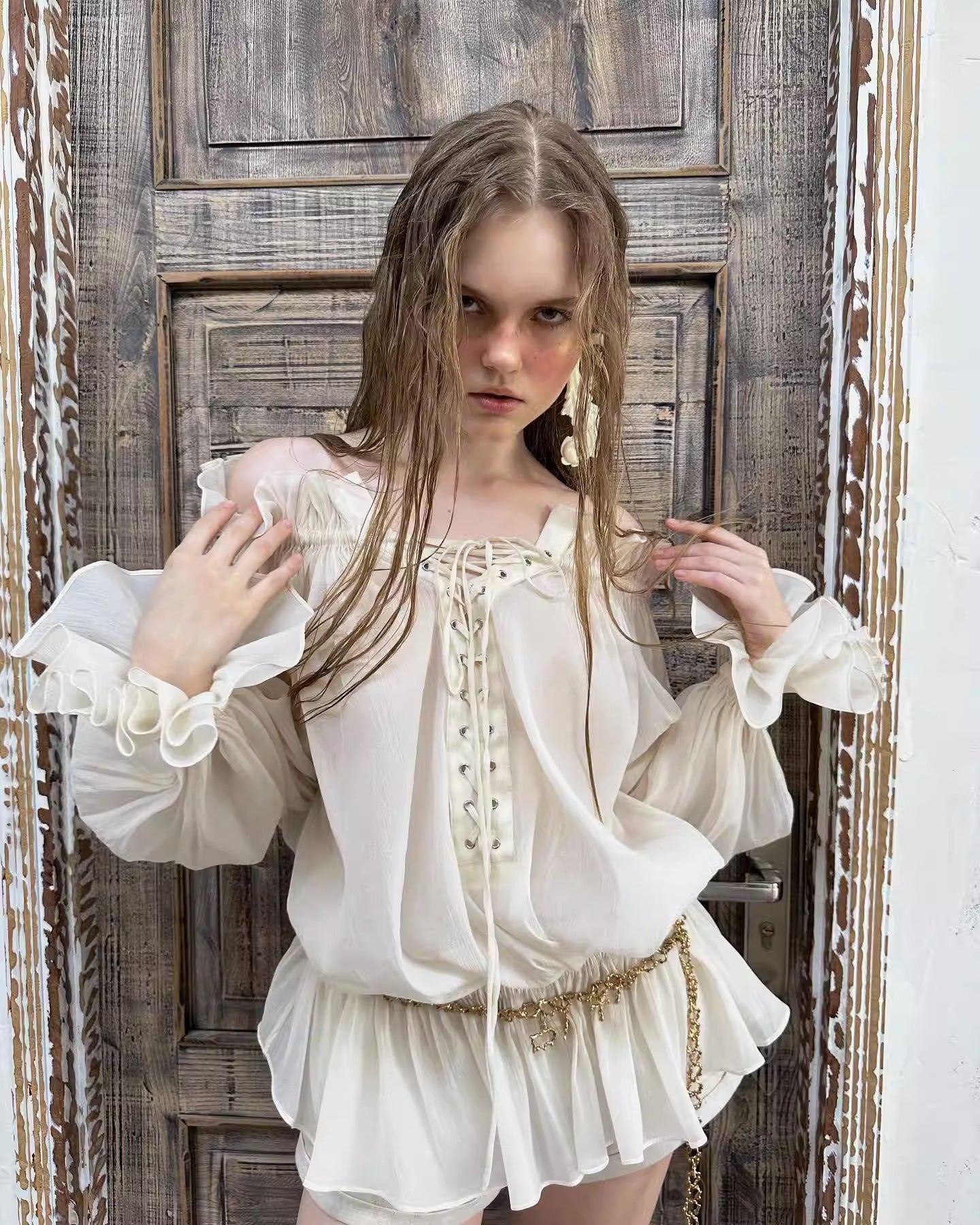 One-shoulder lantern sleeve lace-up top