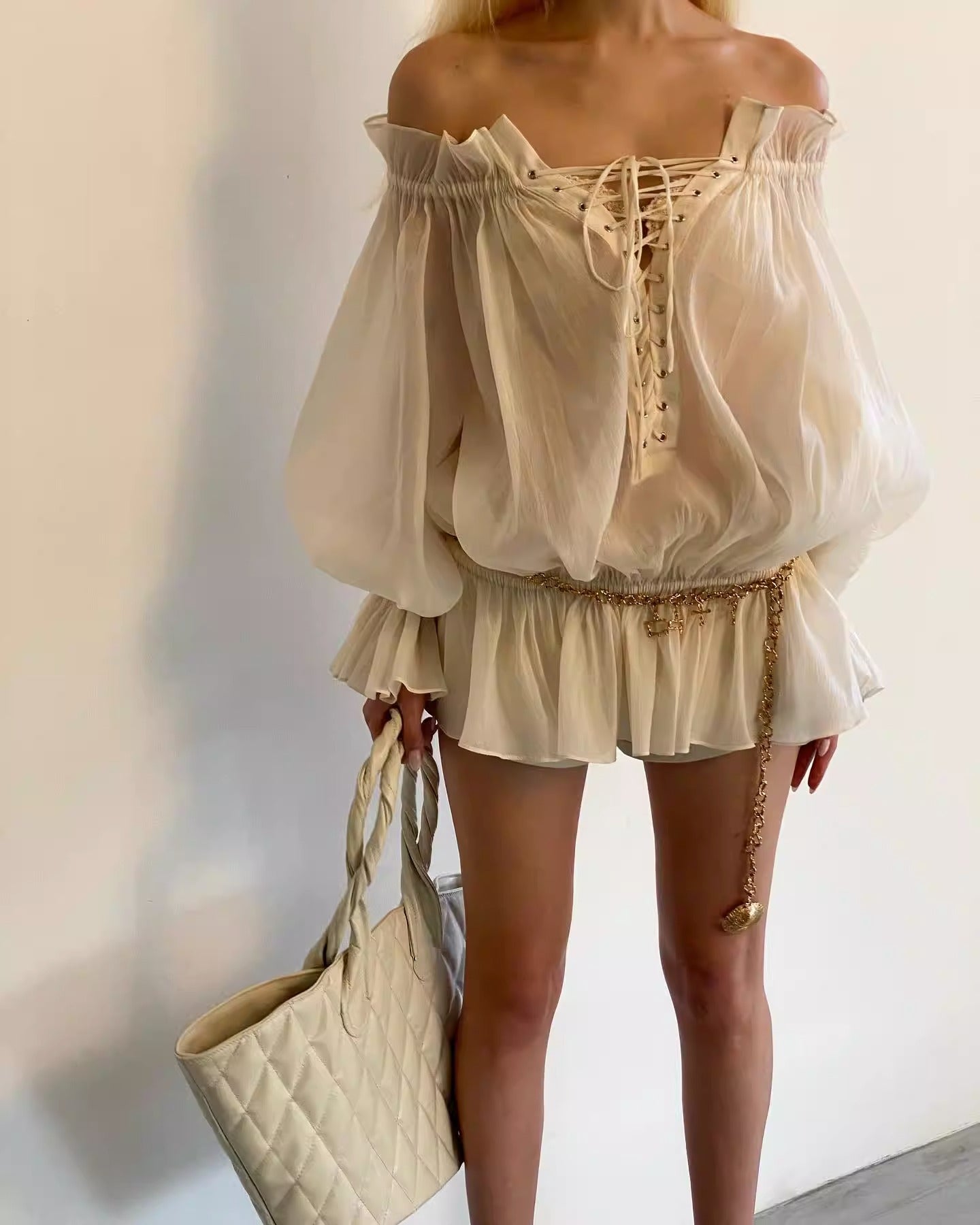 One-shoulder lantern sleeve lace-up top