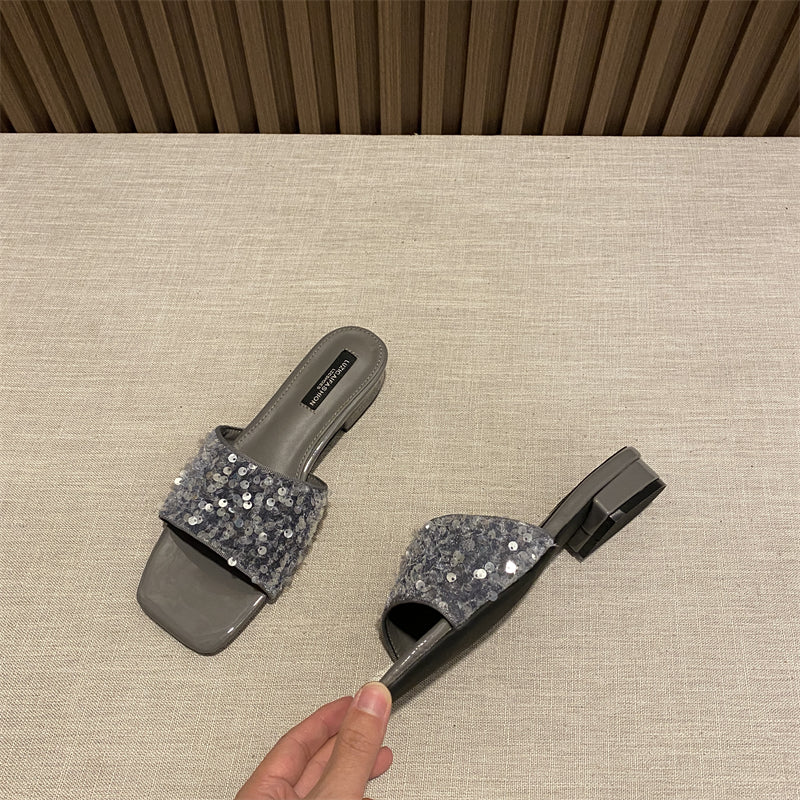 Wear elegant black rhinestone thick heel square toe sandals