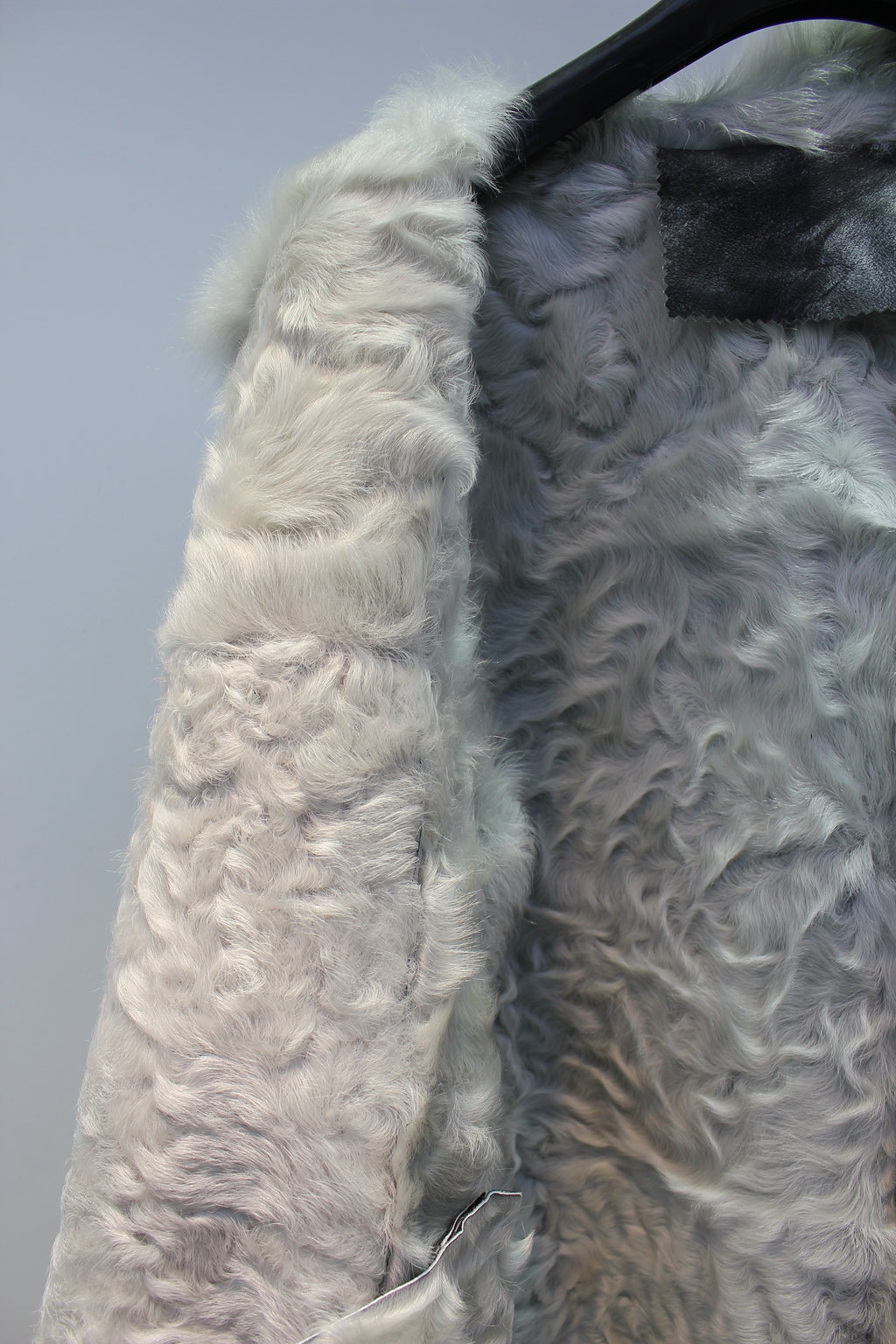 Soft lambskin fur coat with retro textured denim style