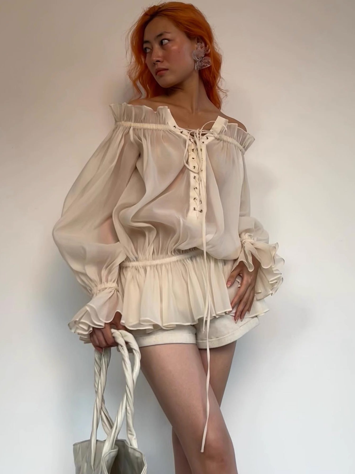 One-shoulder lantern sleeve lace-up top