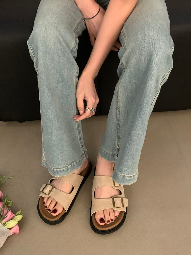 Wearing vintage Birkenstock flat sandals