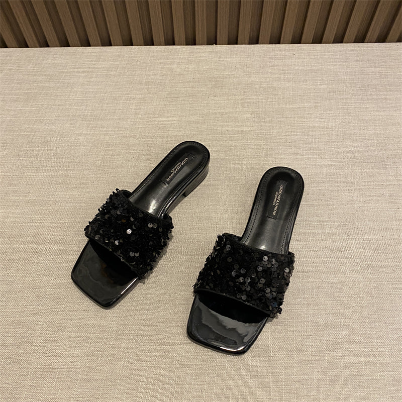 Wear elegant black rhinestone thick heel square toe sandals