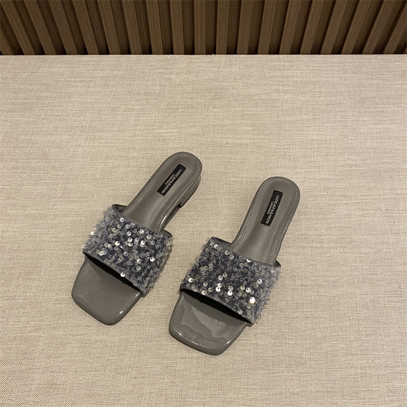 Wear elegant black rhinestone thick heel square toe sandals