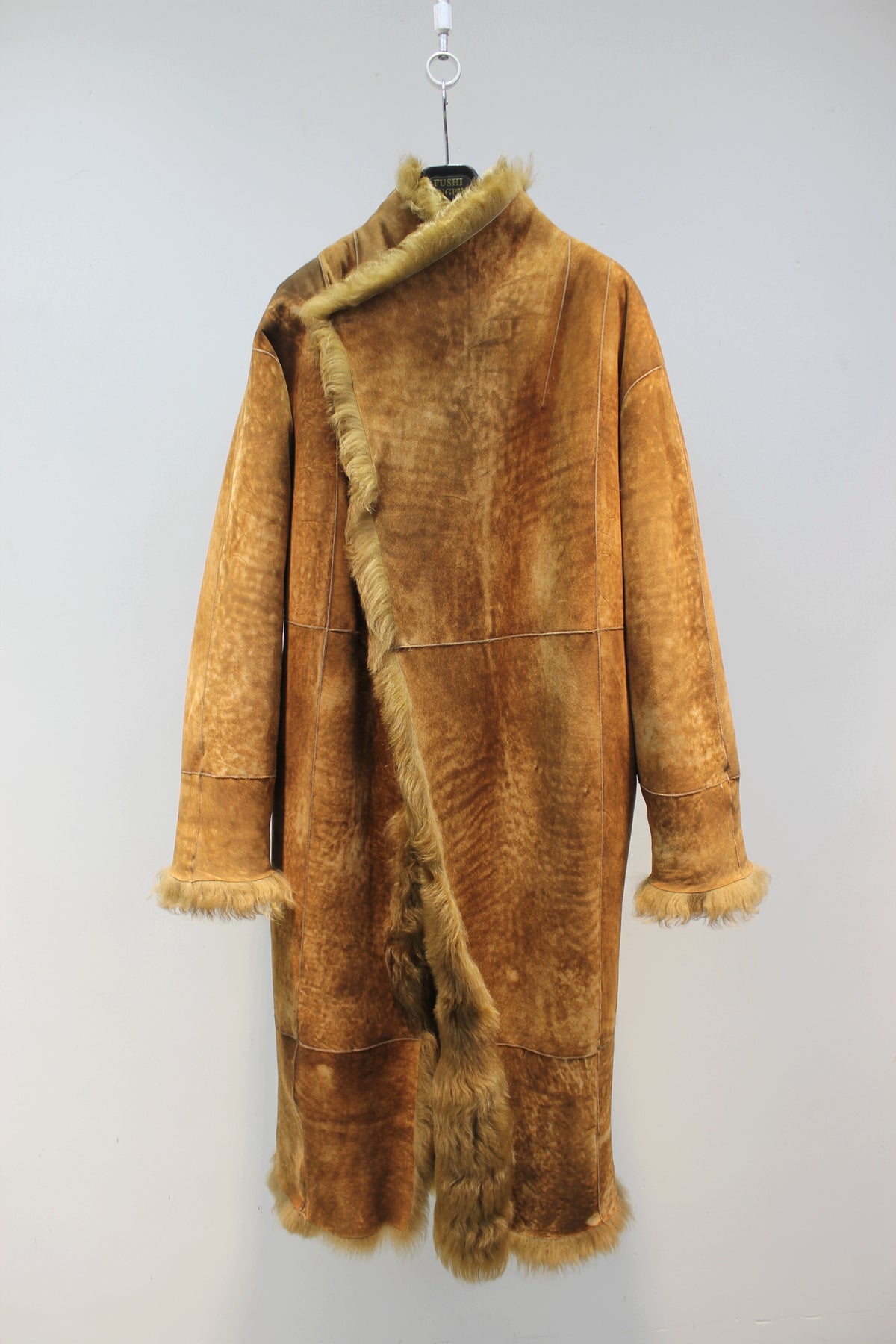 Palace-level Spanish Little Tuscan sheepskin all-in-one mid-length coat