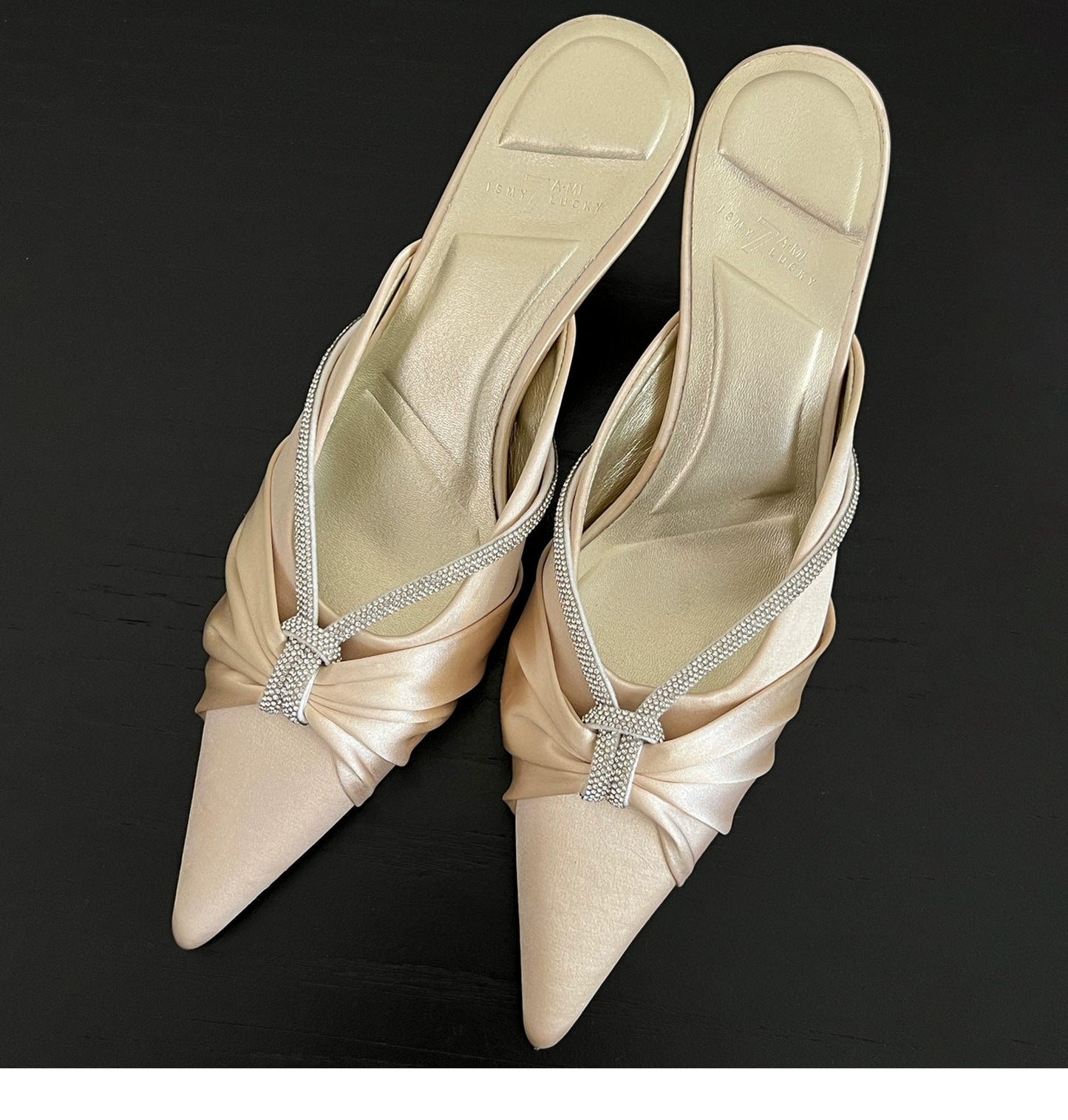 Moonlight almond pointed half-slip satin stilettos