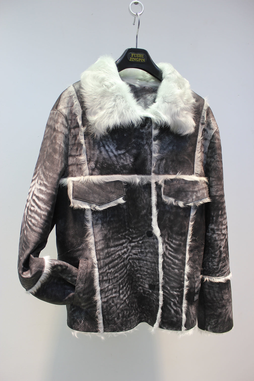 Soft lambskin fur coat with retro textured denim style