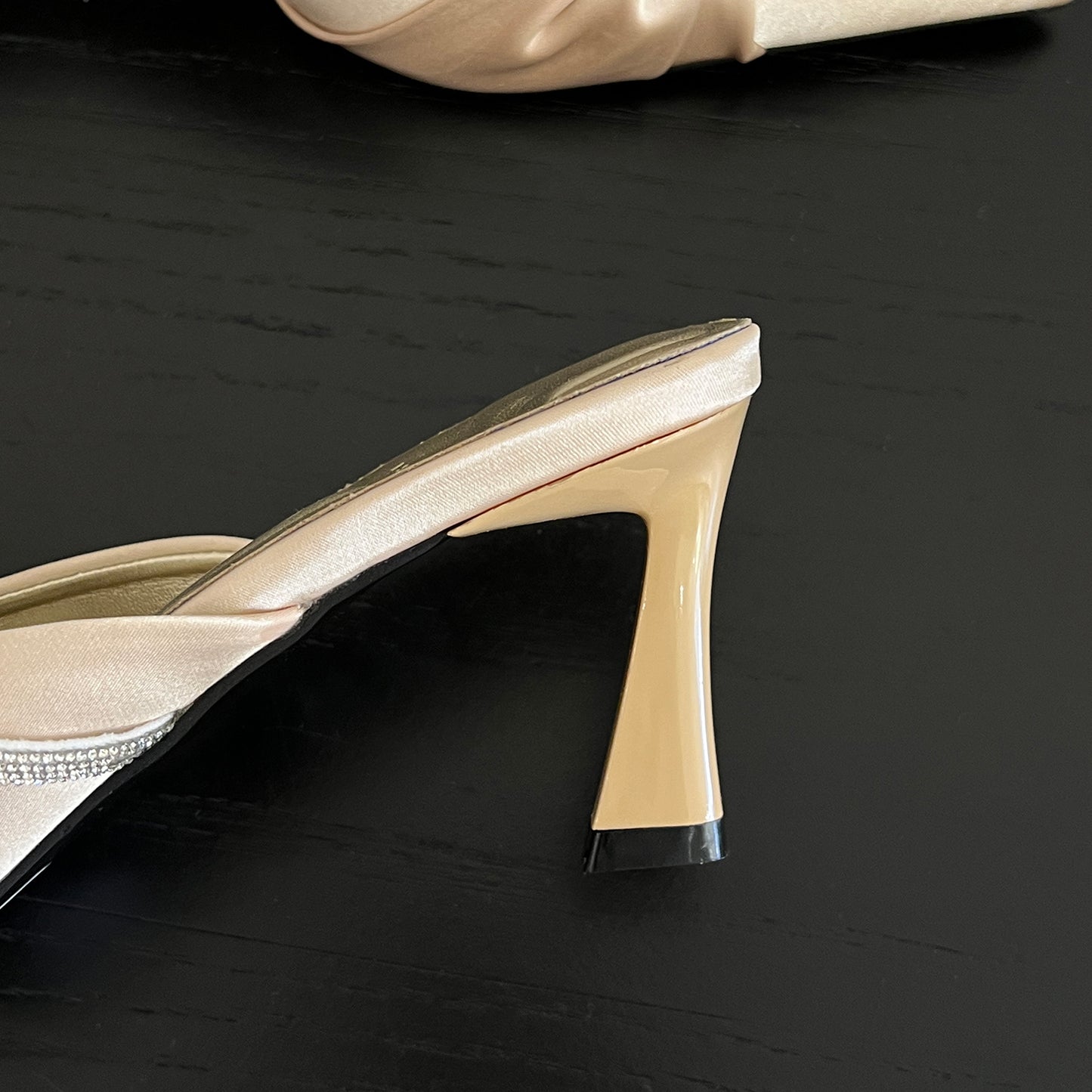 Moonlight almond pointed half-slip satin stilettos