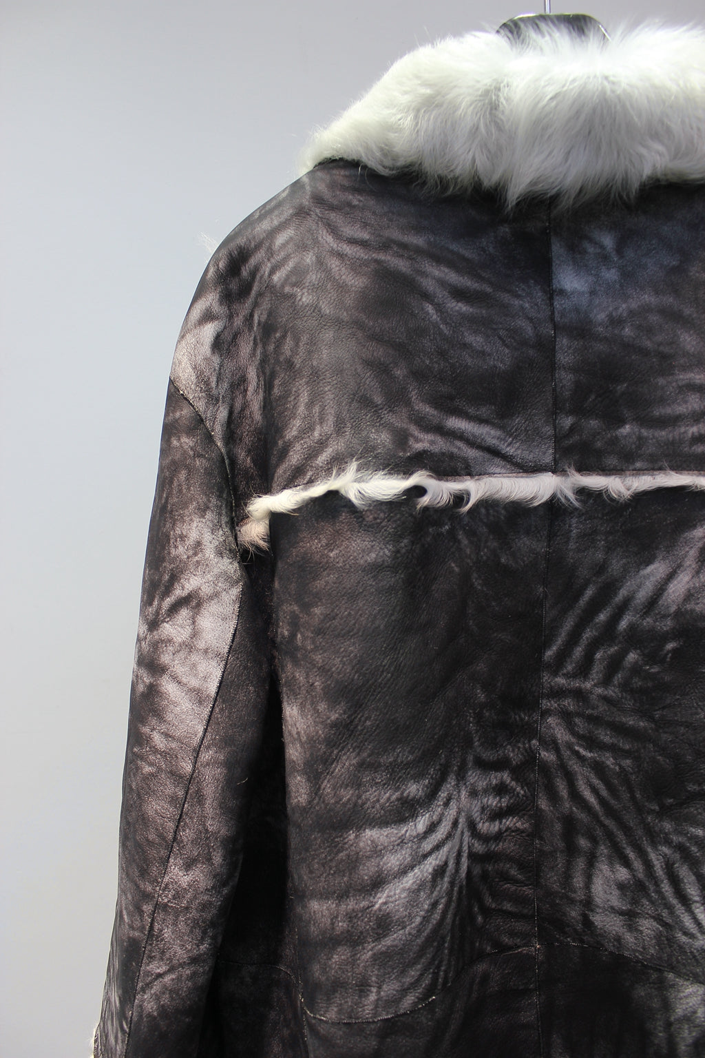 Soft lambskin fur coat with retro textured denim style