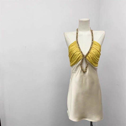 Hand-sewn heavy-duty diamond button halter dress