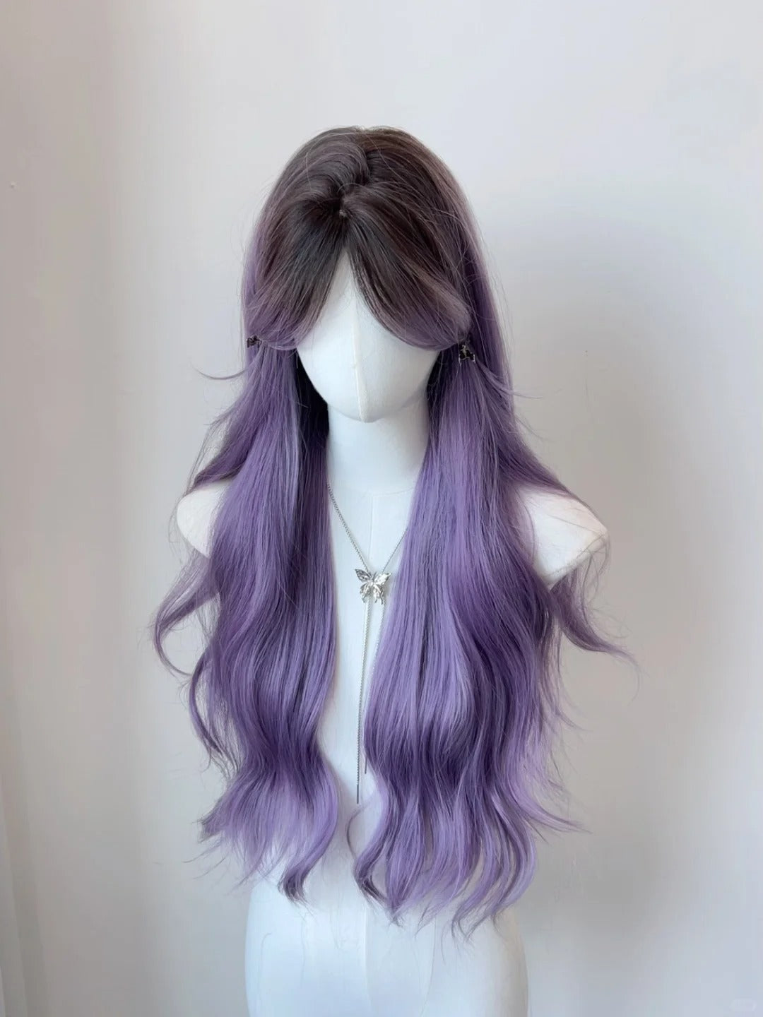 Purple middle-parted gradient long curly hair