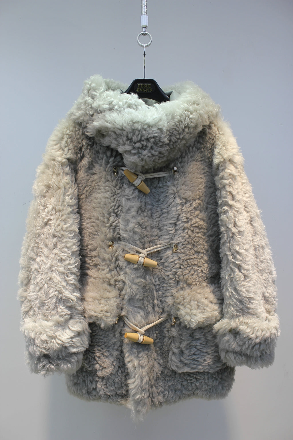 Lcelandic imported sheepskin one-piece hooded horn buckle fur jacket