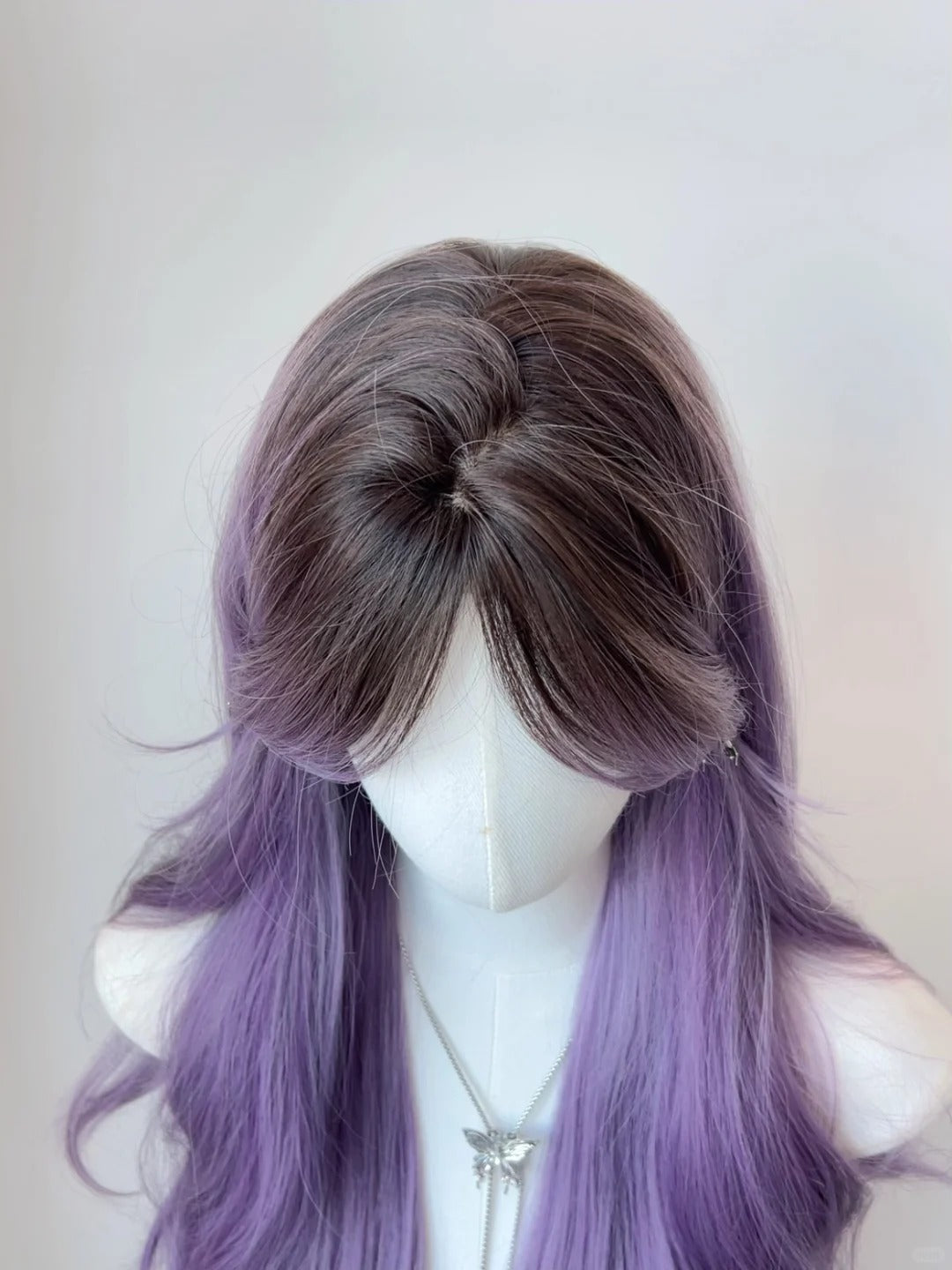 Purple middle-parted gradient long curly hair