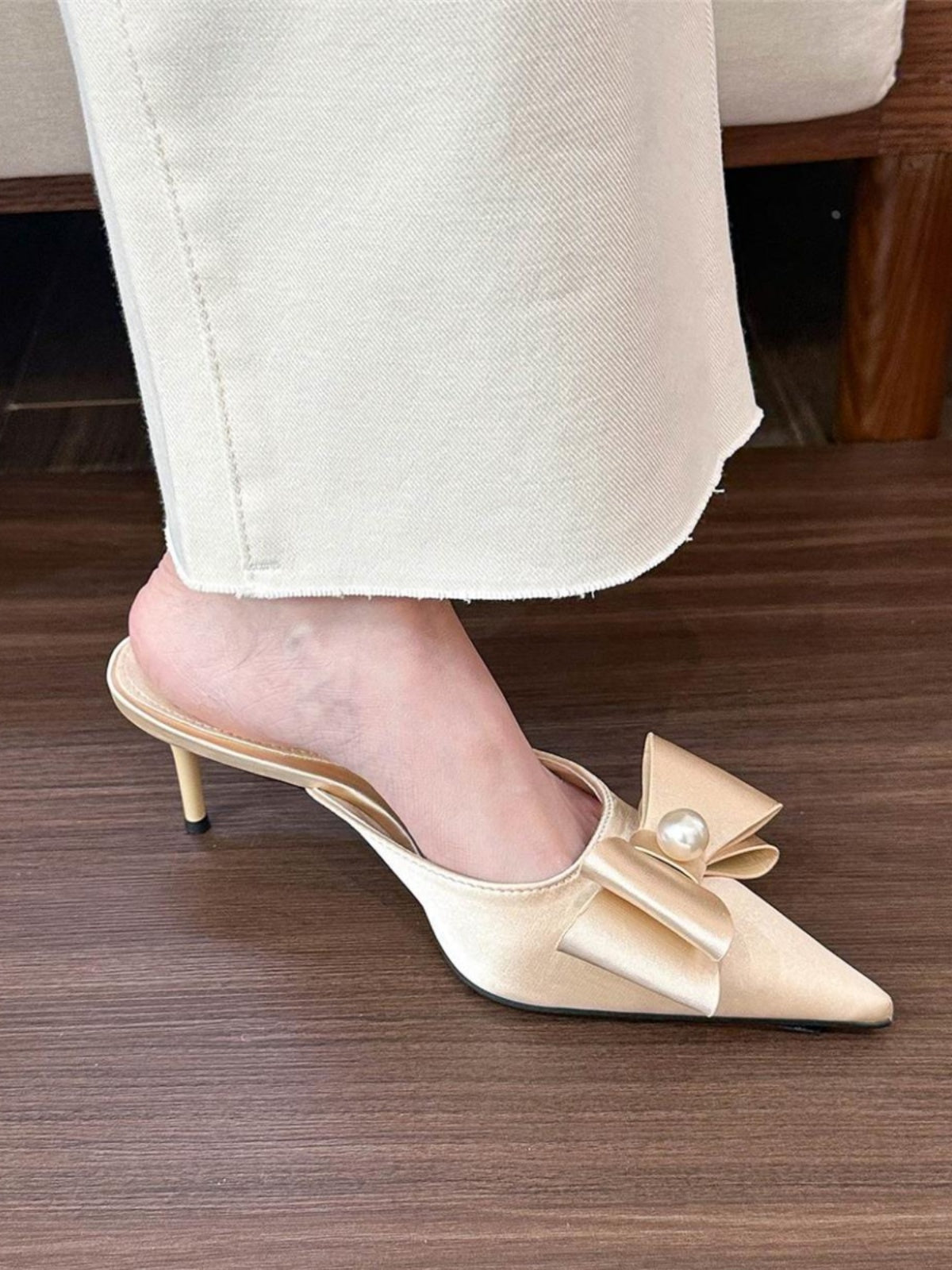 Pointed toe pearl bow pumps