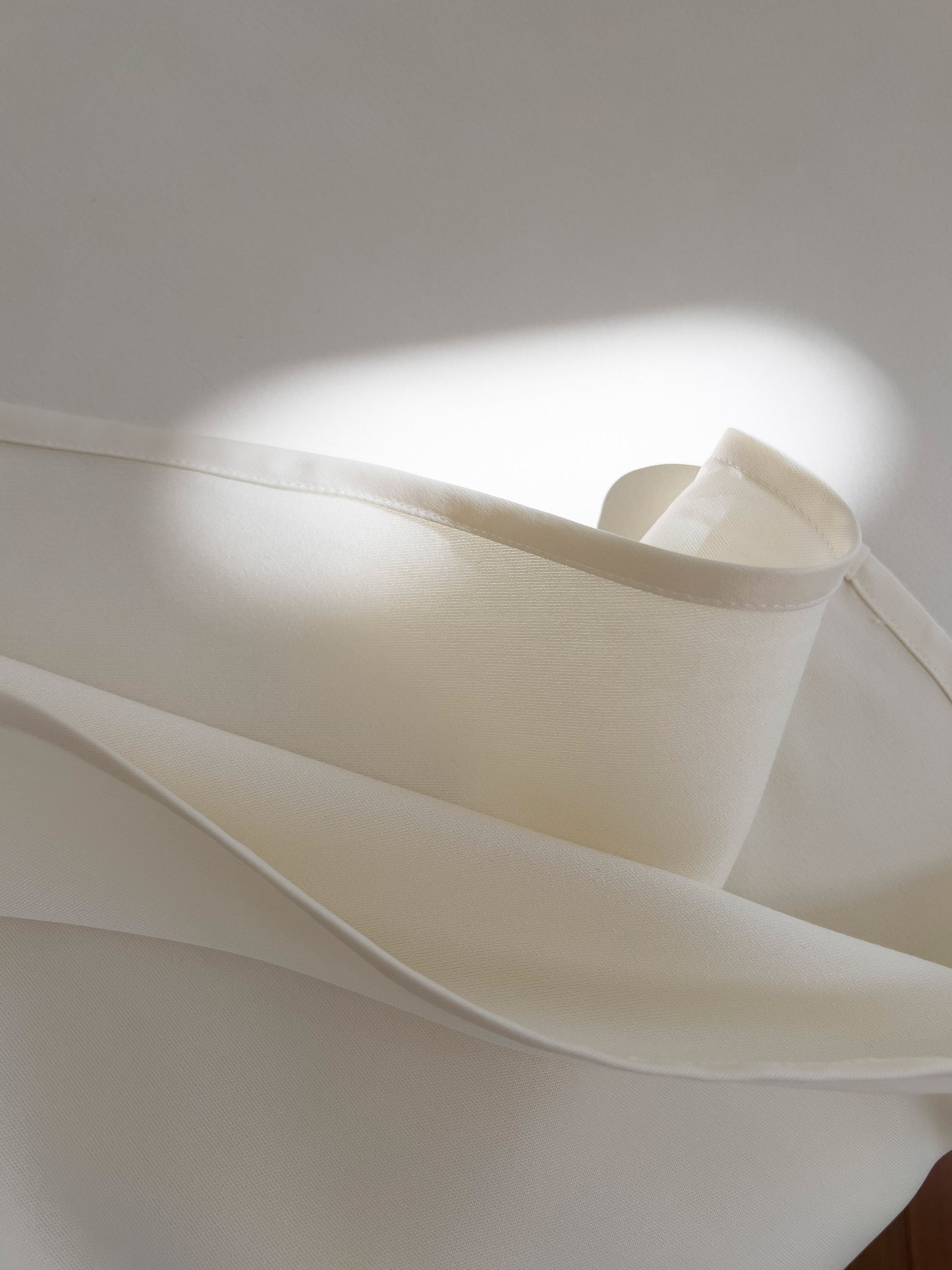 Off-white glossy satin slip dress