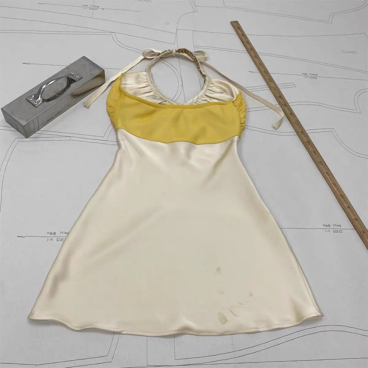 Hand-sewn heavy-duty diamond button halter dress