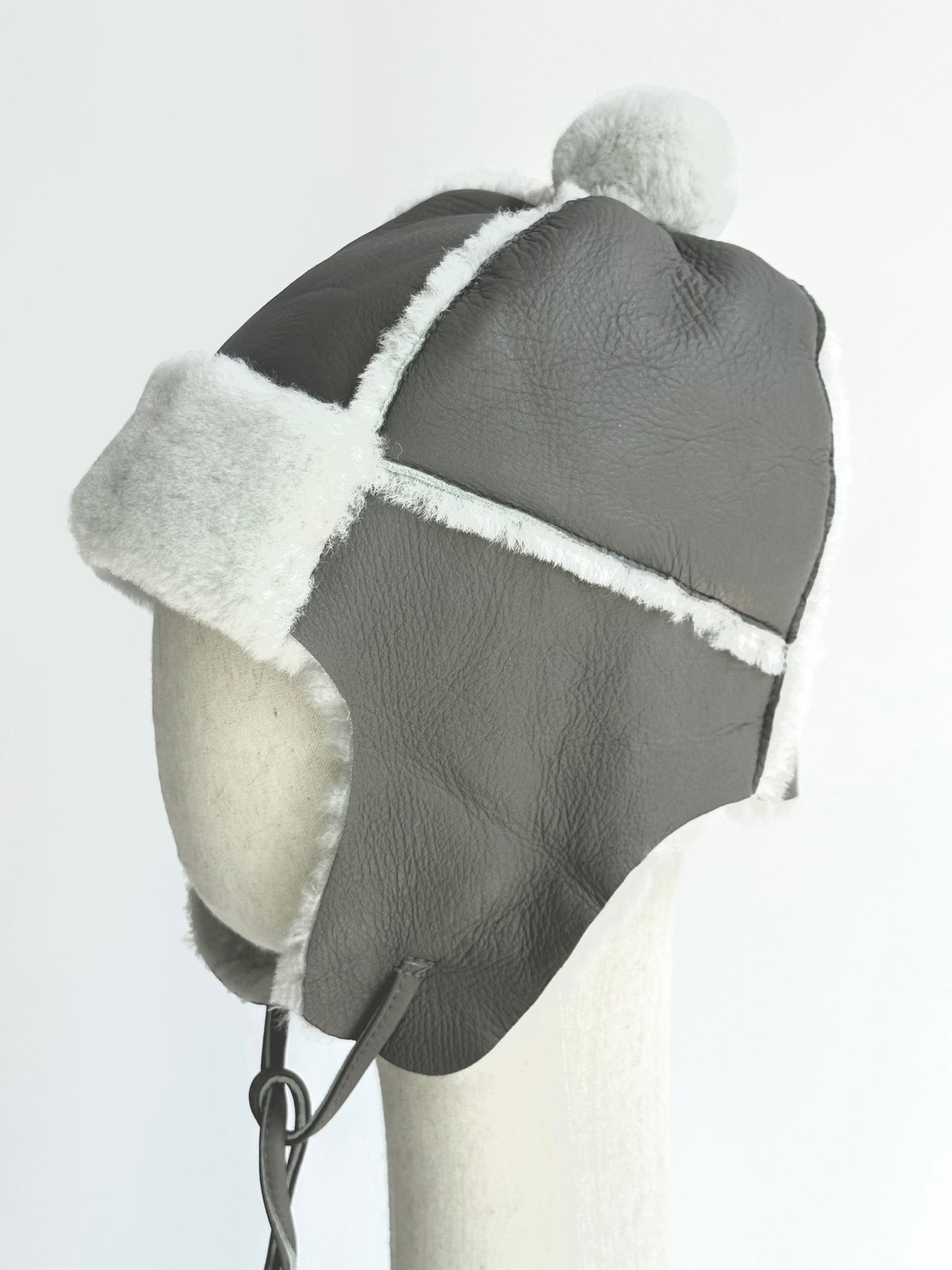 Lmported sheepskin all-in-one hat for men and women windproof fur ear protection hat