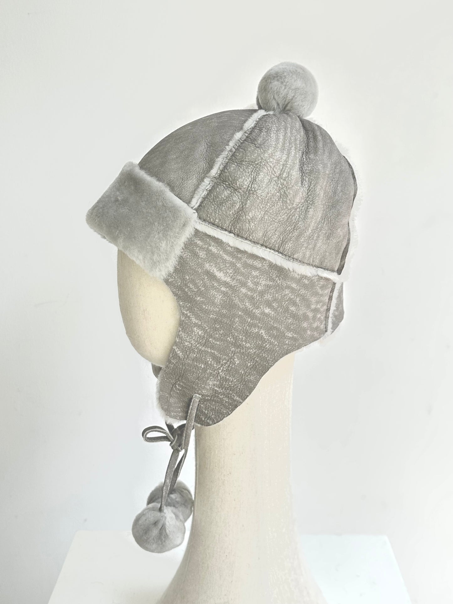 Lmported sheepskin all-in-one hat for men and women windproof fur ear protection hat