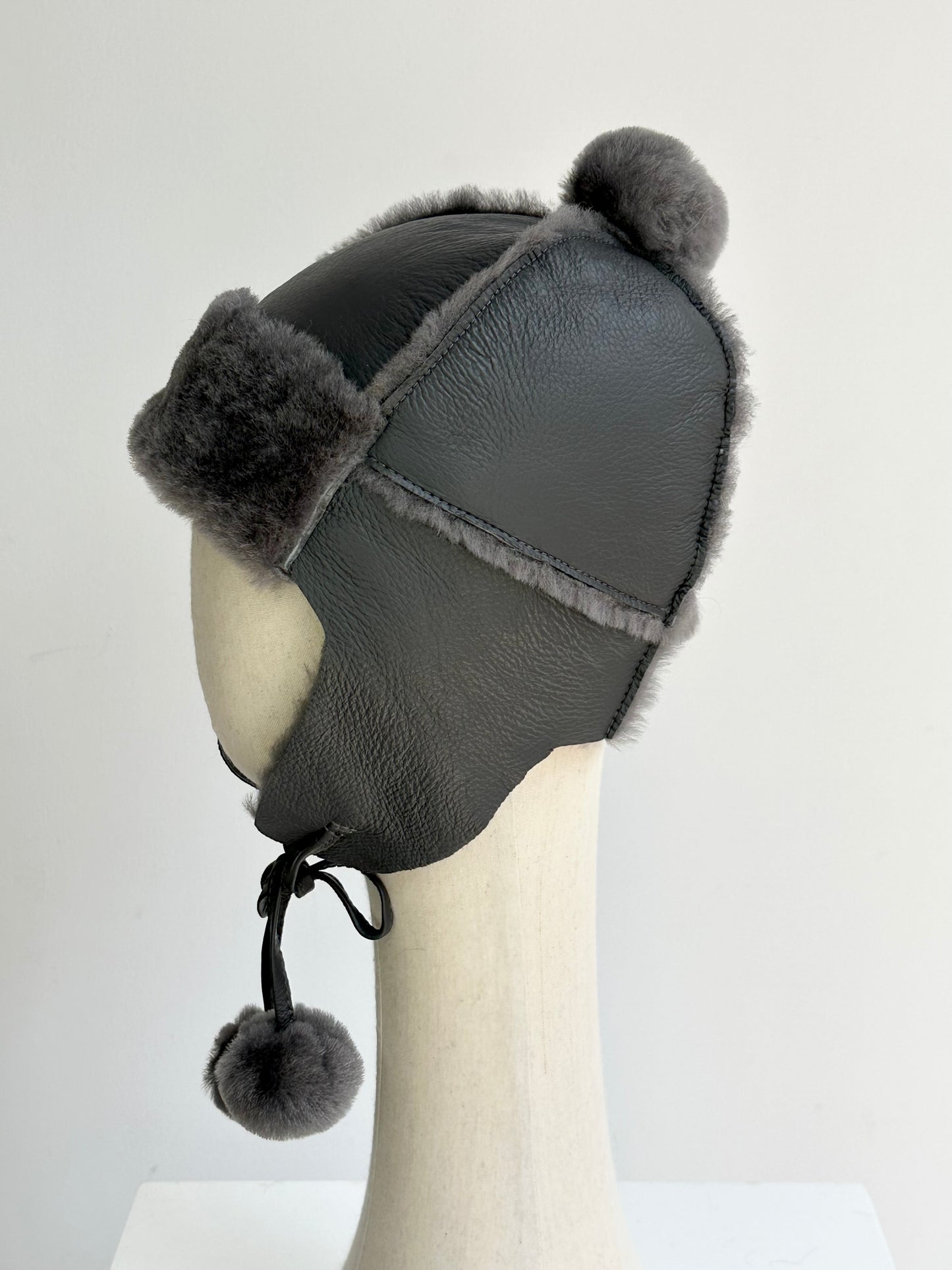 Lmported sheepskin all-in-one hat for men and women windproof fur ear protection hat