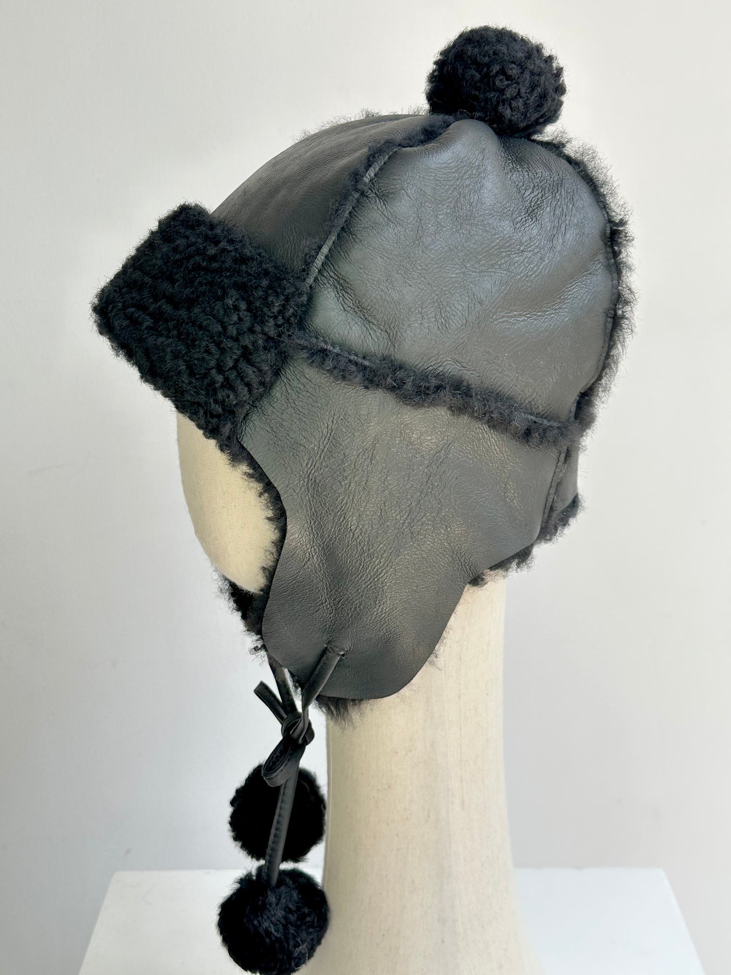 Lmported sheepskin all-in-one hat for men and women windproof fur ear protection hat