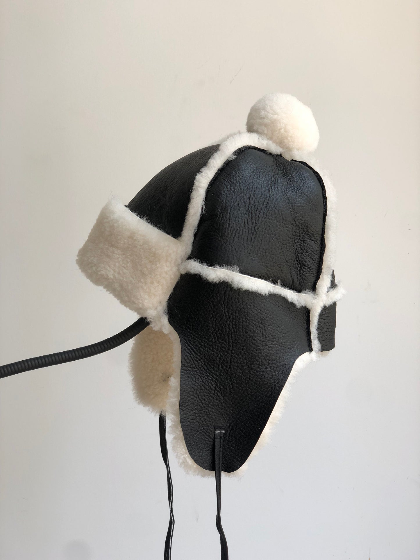 Lmported sheepskin all-in-one hat for men and women windproof fur ear protection hat