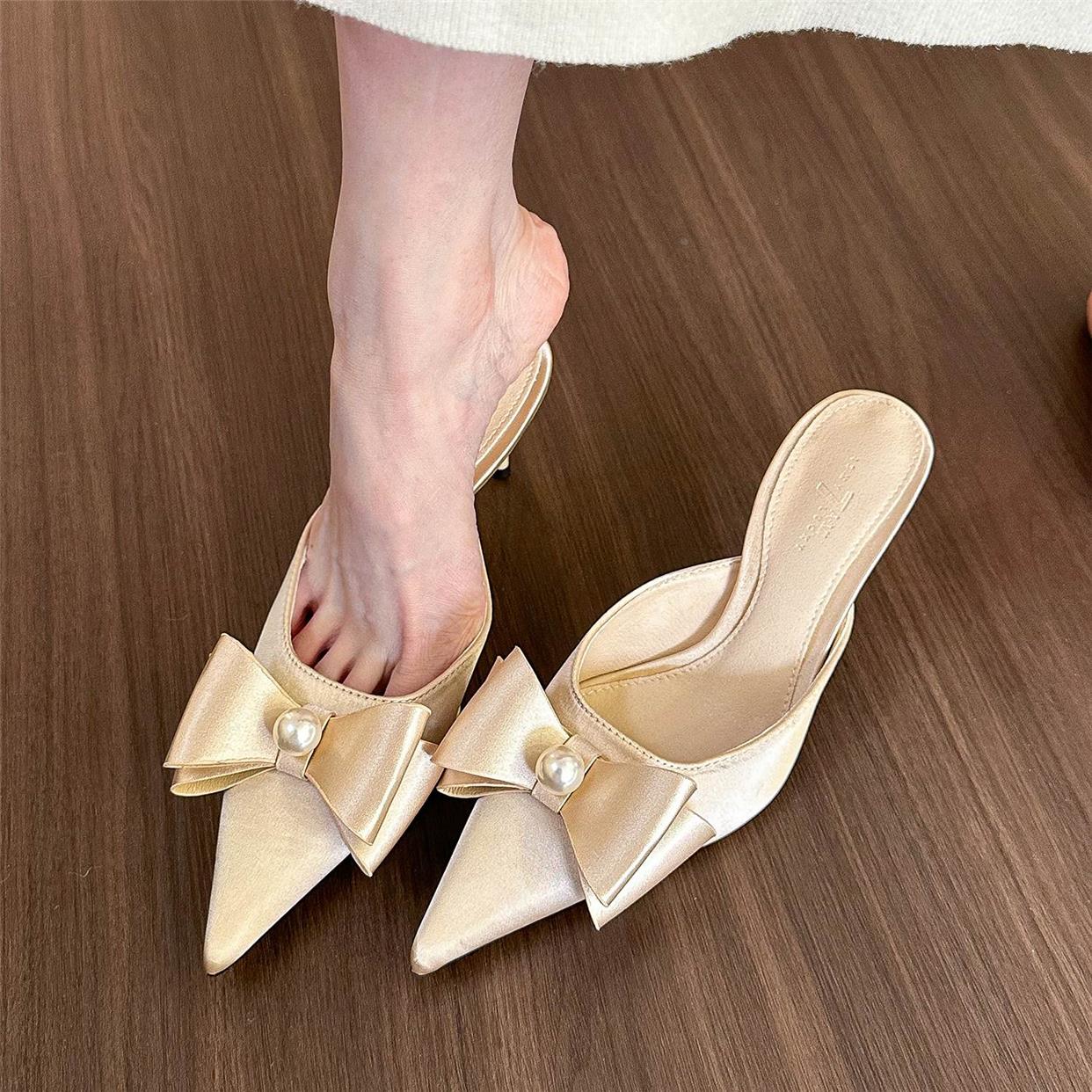 Pointed toe pearl bow pumps