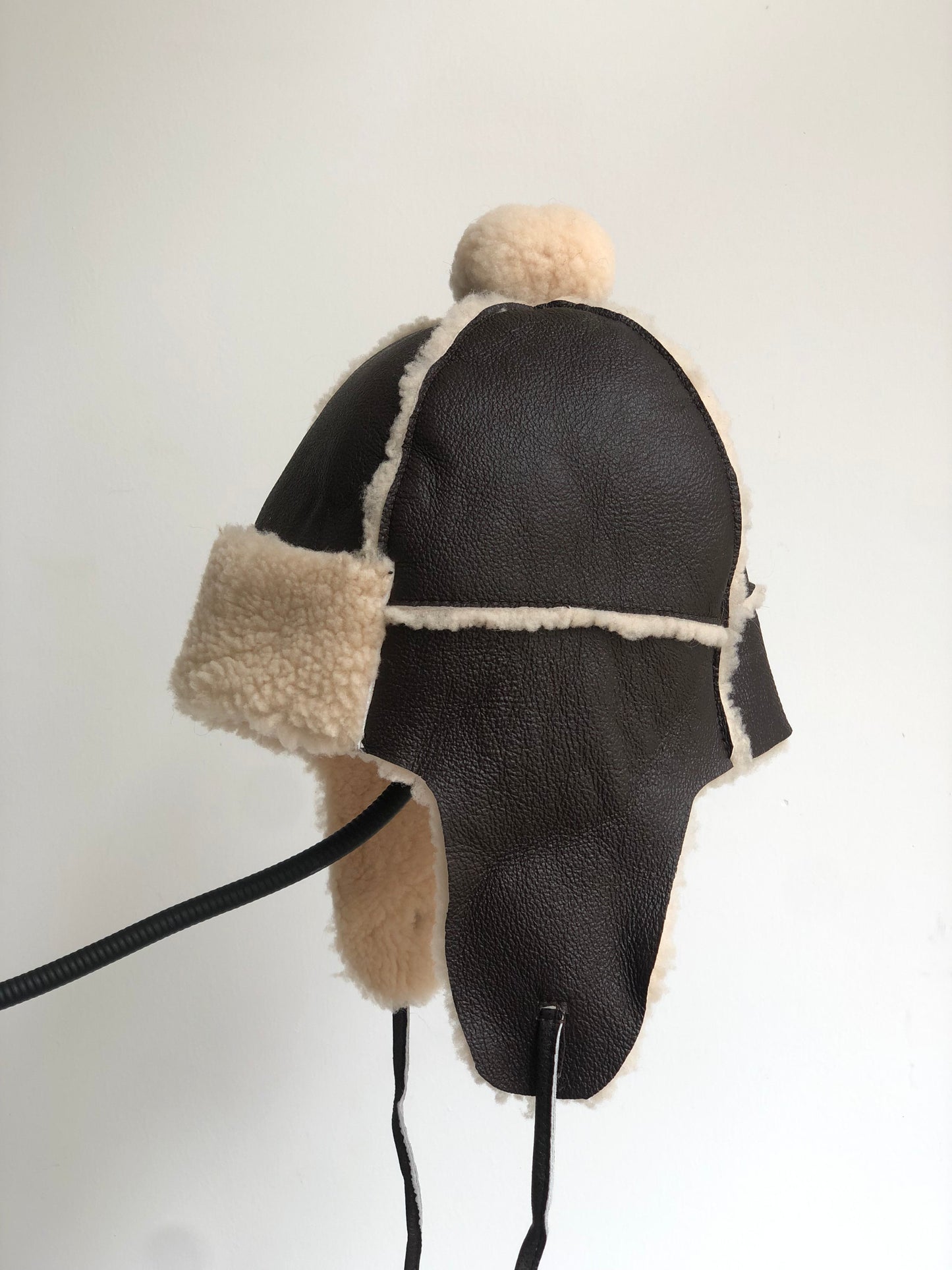 Lmported sheepskin all-in-one hat for men and women windproof fur ear protection hat