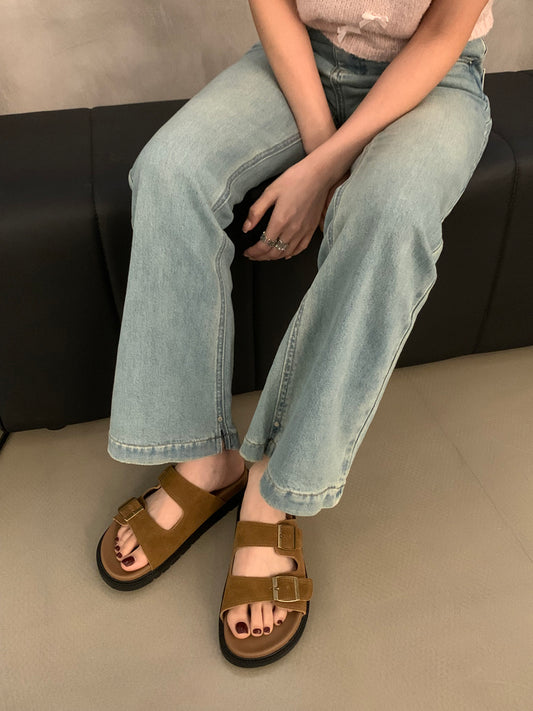 Wearing vintage Birkenstock flat sandals
